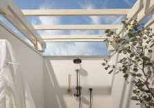 Outdoor shower with view of sky