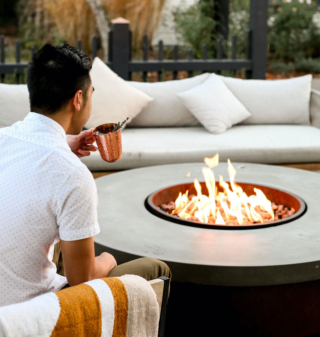 MacArthur Place Man at Firepit